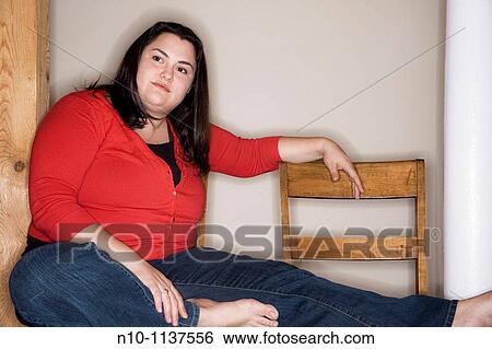 Stock Photograph - Young woman posing. Fotosearch