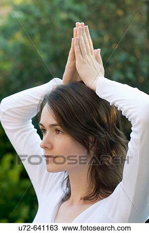 Young Woman Practicing Yoga View Large Photo Image Stock Image - Young Woman Practicing Yoga. Fotosearch