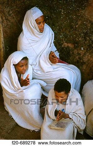 Young woman praying, Lalibela. Ethiopia View Large Photo Image Stock Photo - Young woman praying, Lalibela. Ethiopia. Fotosearch