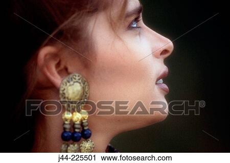 Stock Image - Young woman profile. Fotosearch