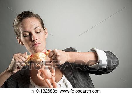 Young woman pulling the hair on a baby doll View Large Photo Image Stock Photography - Young woman pulling the hair on a baby doll. Fotosearch