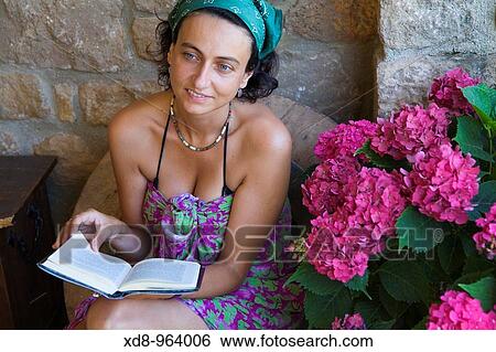 young woman reading View Large Photo Image Stock Photograph - young woman reading. Fotosearch
