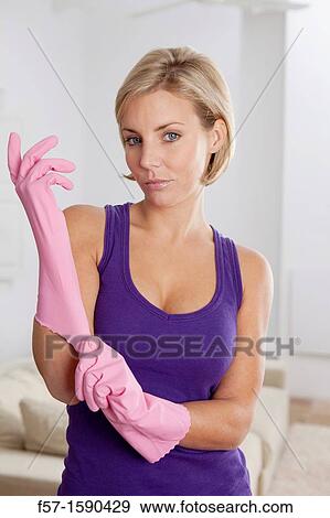 Young woman ready to clean the house View Large Photo Image Stock Photo - Young woman ready to clean the house. Fotosearch