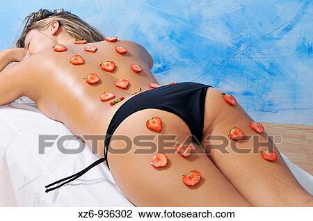 Young woman receiving a beauty treatment with natural strawberries View Large Photo Image Stock Image - Young woman receiving a beauty treatment with natural strawberries. Fotosearch