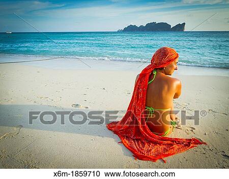 Young woman relaxing Long beach Phi Phi Don island Krabi province, Andaman Sea, Thailand View Large Photo Image Stock Image - Young woman relaxing Long beach Phi Phi Don island Krabi province, Andaman Sea, Thailand. Fotosearch