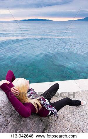 Young woman romantic in sunset View Large Photo Image Stock Photograph - Young woman romantic in sunset. Fotosearch