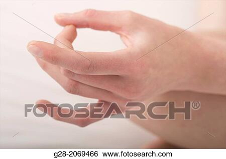Young woman? s hands, close up, while practicing Yoga View Large Photo Image Stock Photograph - Young woman? s hands, close up, while practicing Yoga. Fotosearch