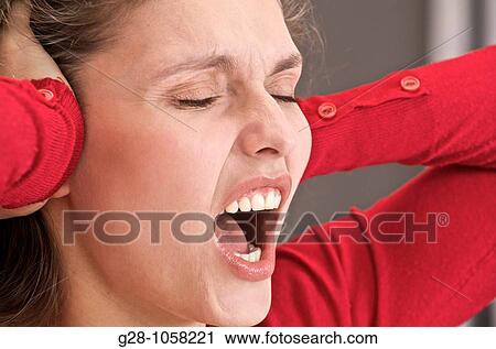 young woman screeming out of fear, despair, fright or stress View Large Photo Image Stock Image - young woman screeming out of fear, despair, fright or stress. Fotosearch