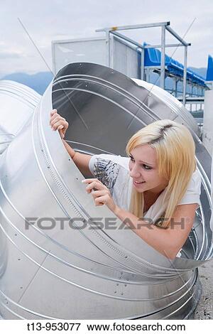 Young woman, seek and hide game View Large Photo Image Stock Photo - Young woman, seek and hide game. Fotosearch