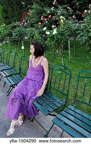 Young woman sitting on chair in Volksgarten Park, Vienna, Austria, Europe View Large Photo Image Stock Image - Young woman sitting on chair in Volksgarten Park, Vienna, Austria, Europe. Fotosearch