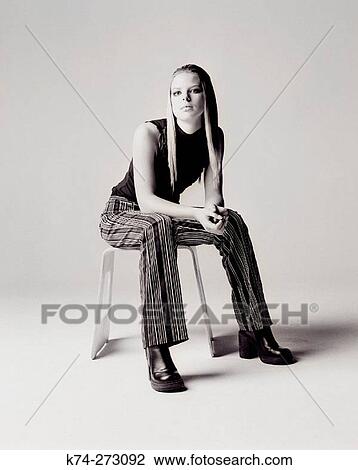 Young Woman Sitting View Large Photo Image Stock Image - Young Woman Sitting. Fotosearch