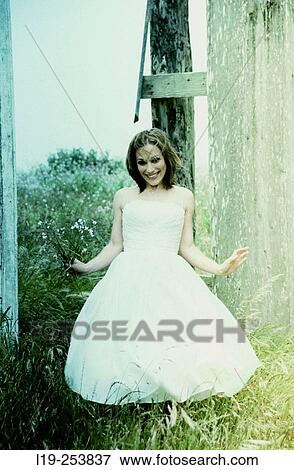 Young woman smiling, being silly View Large Photo Image Stock Photo - Young woman smiling, being silly. Fotosearch