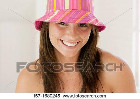 Young woman smiling to camera View Large Photo Image Stock Photography - Young woman smiling to camera. Fotosearch