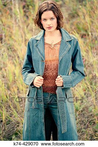 Young Woman Standing Outside In Field View Large Photo Image Stock Image - Young Woman Standing Outside In Field. Fotosearch