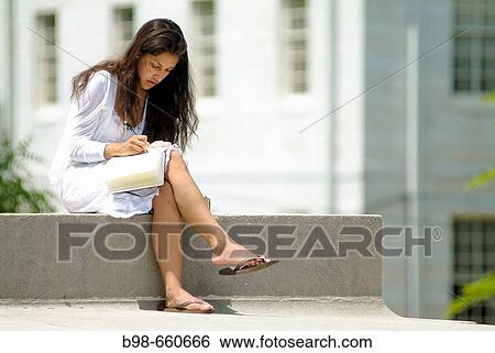 Young woman studying on Graduation Day at Cambridge, Harvard University, Massachusetts, USA View Large Photo Image Stock Photograph - Young woman studying on Graduation Day at Cambridge, Harvard University, Massachusetts, USA. Fotosearch