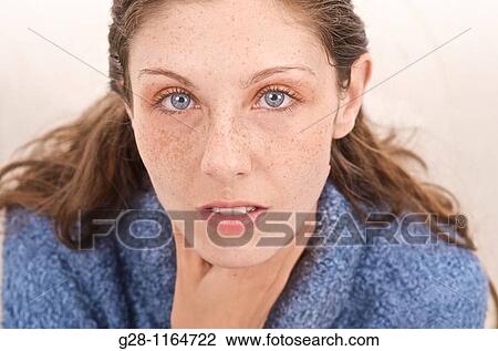 Young woman suffering from a sore throat View Large Photo Image Stock Image - Young woman suffering from a sore throat. Fotosearch