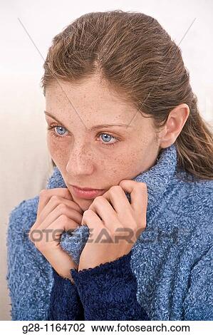 Stock Image - young woman suffering or depressed. Fotosearch