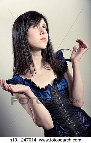 Young woman thinking View Large Photo Image Picture - Young woman thinking. Fotosearch