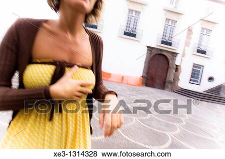 Stock Photo - Young woman touching herself. Fotosearch