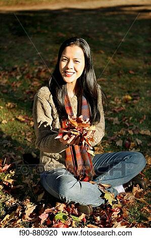 Young woman w autumn leaves MR View Large Photo Image Stock Image - Young woman w autumn leaves MR. Fotosearch