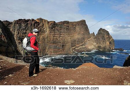 young woman walking on Cevada islet, Sao Lourenco peninsula, Madeira island, Atlantic Ocean, Portugal View Large Photo Image Stock Photo - young woman walking on Cevada islet, Sao Lourenco peninsula, Madeira island, Atlantic Ocean, Portugal. Fotosearch