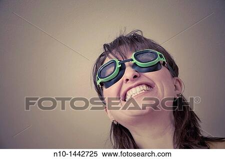 Young woman wearing goggles View Large Photo Image Stock Photography - Young woman wearing goggles. Fotosearch