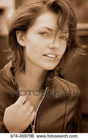 Young Woman Wearing Leather Jacket View Large Photo Image Stock Photograph - Young Woman Wearing Leather Jacket. Fotosearch