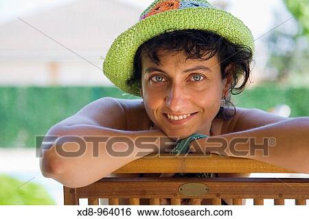 young woman with a hat View Large Photo Image Stock Photograph - young woman with a hat. Fotosearch