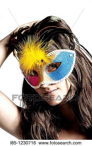 Young woman with carnival mask View Large Photo Image Stock Photograph - Young woman with carnival mask. Fotosearch