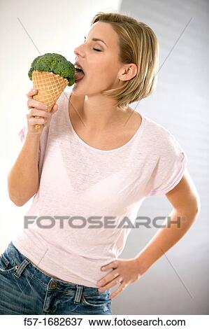 Young woman with diet concerns View Large Photo Image Stock Photo - Young woman with diet concerns. Fotosearch