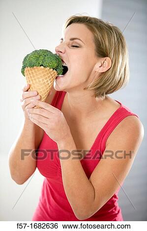 Young woman with diet concerns View Large Photo Image Stock Photograph - Young woman with diet concerns. Fotosearch