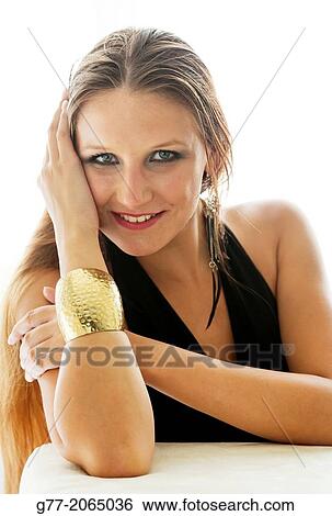 Young woman with gold bracelet and evening dress. Czech Republic. Prague. View Large Photo Image Stock Photograph - Young woman with gold bracelet and evening dress. Czech Republic. Prague.. Fotosearch