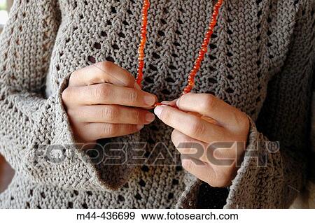 Young woman with necklace. View Large Photo Image Stock Photo - Young woman with necklace.. Fotosearch