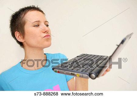 Young woman with notebook View Large Photo Image Stock Photo - Young woman with notebook. Fotosearch