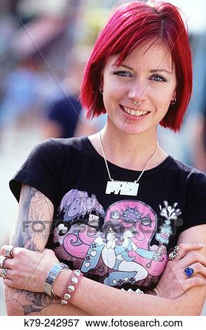 Young woman with pink hair View Large Photo Image Stock Photo - Young woman with pink hair. Fotosearch