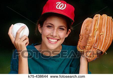 Young woman with softball and mitt View Large Photo Image Picture - Young woman with softball and mitt. Fotosearch