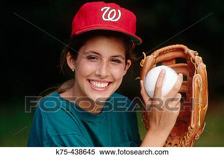 Young woman with softball in mitt View Large Photo Image Stock Photography - Young woman with softball in mitt. Fotosearch