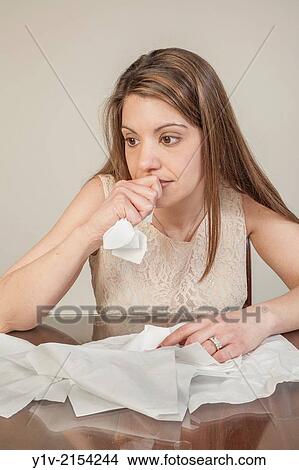 Young woman with tissues. View Large Photo Image Picture - Young woman with tissues.. Fotosearch