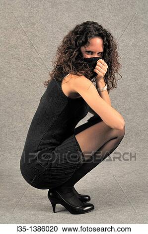 Young woman with very long legs View Large Photo Image Stock Image - Young woman with very long legs. Fotosearch