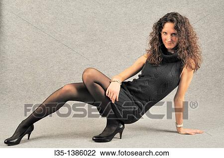 Young woman with very long legs View Large Photo Image Stock Image - Young woman with very long legs. Fotosearch
