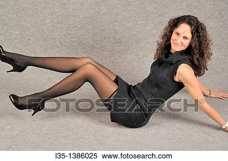 Young woman with very long legs View Large Photo Image Stock Photography - Young woman with very long legs. Fotosearch