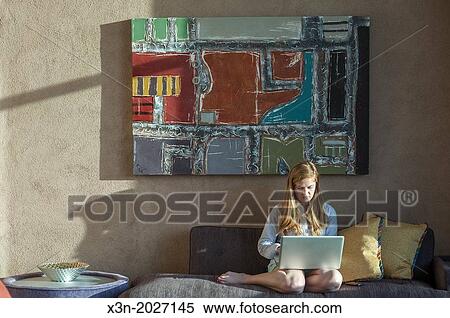 Young Woman Working at Home. View Large Photo Image Stock Photography - Young Woman Working at Home.. Fotosearch