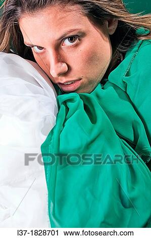Young woman wrapped in green and white cloth View Large Photo Image Stock Image - Young woman wrapped in green and white cloth. Fotosearch