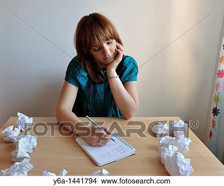 Picture - Young woman writing letter. Fotosearch