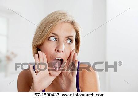 Young woman yelling View Large Photo Image Stock Photo - Young woman yelling. Fotosearch