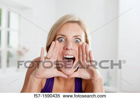 Young woman yelling View Large Photo Image Stock Photography - Young woman yelling. Fotosearch