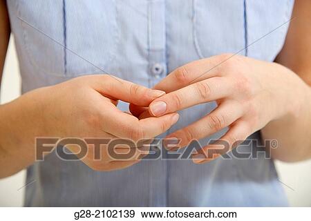 young woman's hands and fingers scratching her hands and fingers, close up, concept View Large Photo Image Stock Photo - young woman's hands and fingers scratching her hands and fingers, close up, concept. Fotosearch