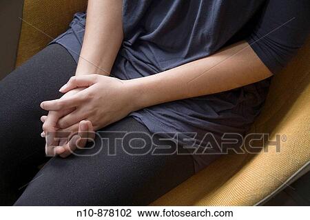 Young woman's hands in her lap. View Large Photo Image Stock Image - Young woman's hands in her lap.. Fotosearch