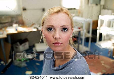 Stock Image - Young women in loft. Fotosearch