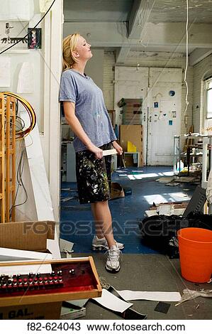 Young women in loft View Large Photo Image Stock Image - Young women in loft. Fotosearch